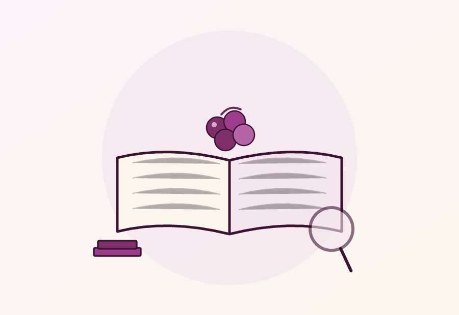 Ilustração de um livro aberto com um cacho de uvas e uma lupa